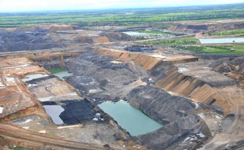 Water sits in the pits at Curragh mine, 14km north-west of Blackwater during the recent floods across Central Queensland. Water sits in the pits at Curragh mine, 14km north-west of Blackwater during the recent floods across Central Queensland.
